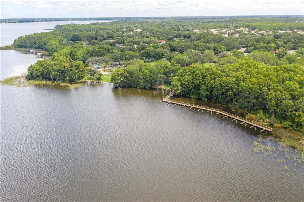 4324 Auston Way Palm Harbor, FL 34685 - Photo 54 of 54 an aerial view of residential house with outdoor space and lake view