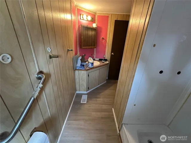 a bathroom with a toilet and a sink