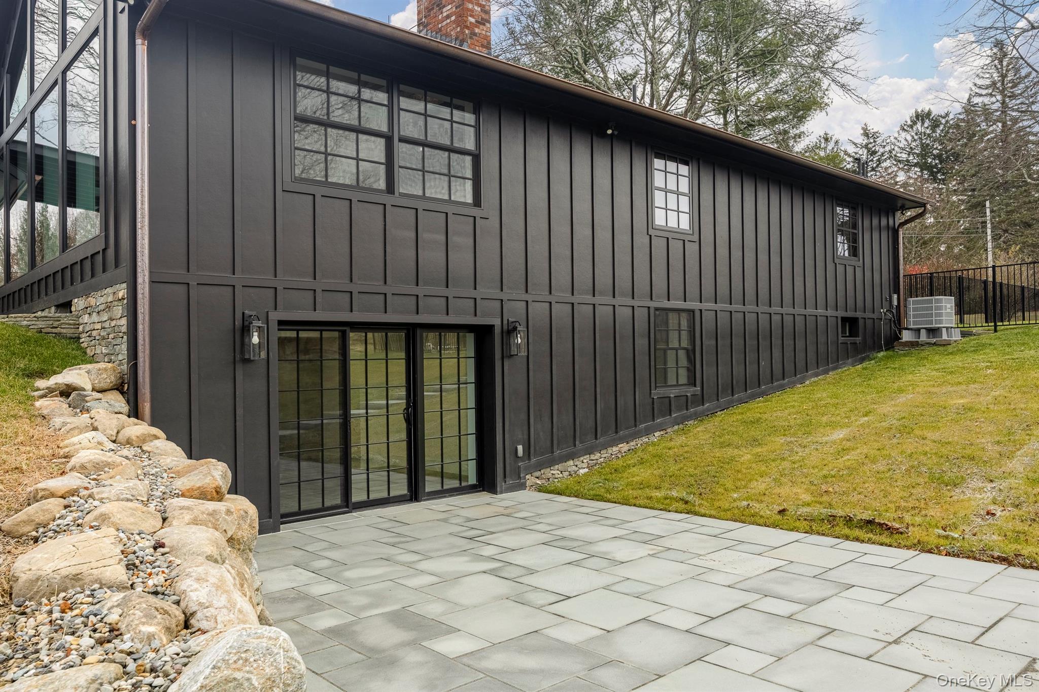 97 Valley Farm Road Millbrook, NY 12545 - Photo 33 of 50 Glass slider from lower level to patio