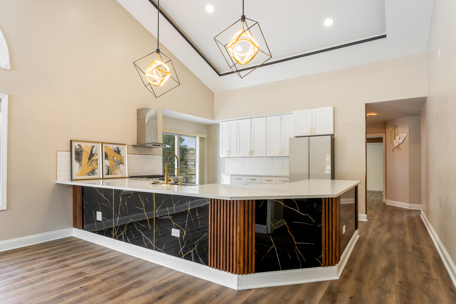 902 Cornwallis Lane Munster, IN 46321 - Photo 13 of 59 a kitchen with kitchen island a counter space a sink appliances and cabinets