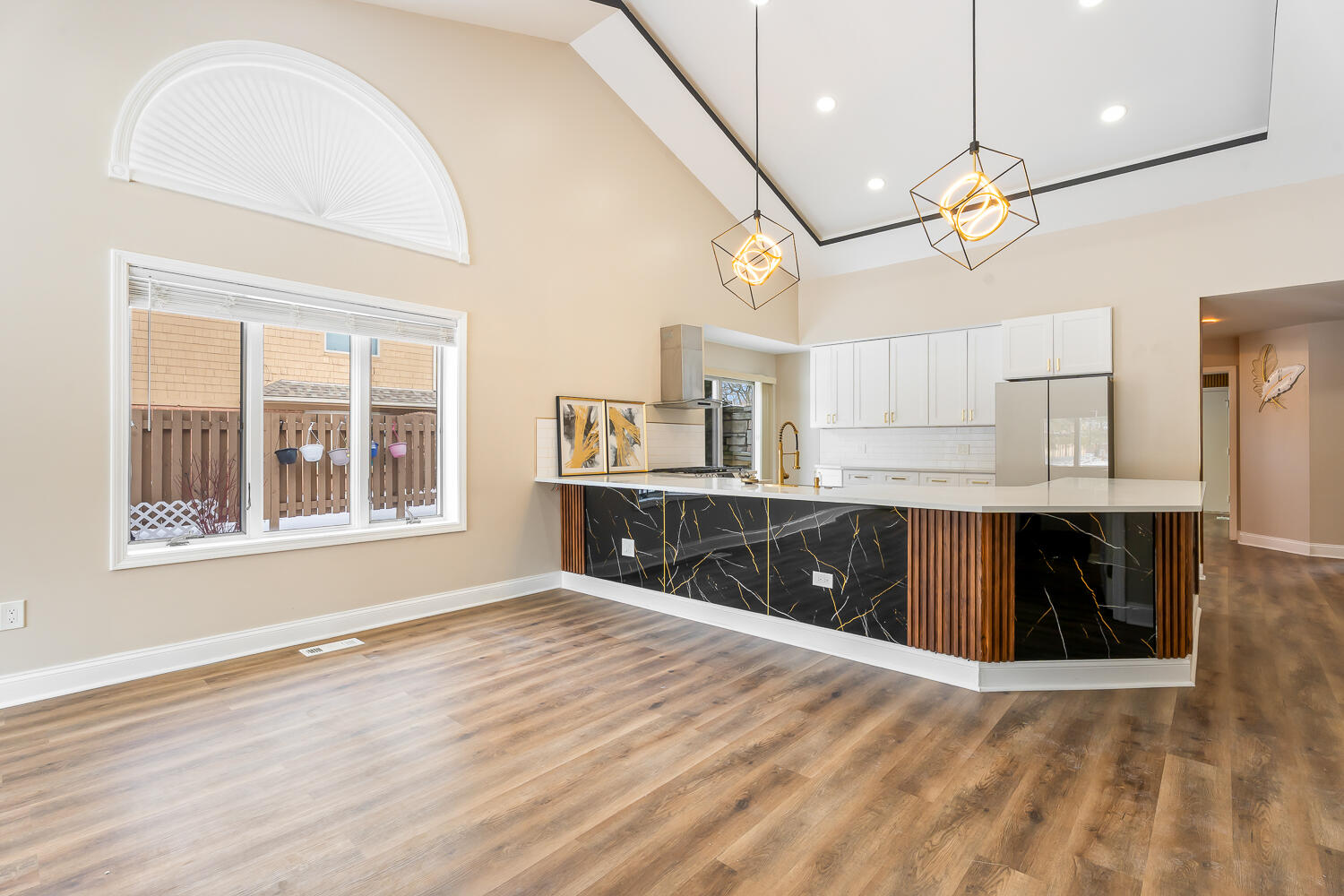 902 Cornwallis Lane Munster, IN 46321 - Photo 14 of 59 a kitchen with stainless steel appliances granite countertop a sink window and wooden floor
