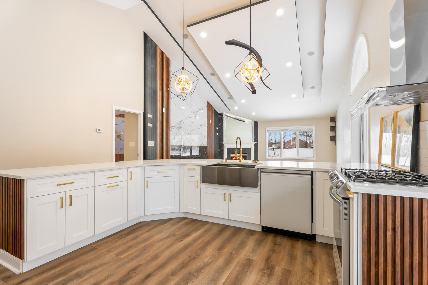 902 Cornwallis Lane Munster, IN 46321 - Photo 17 of 59 a kitchen with stainless steel appliances granite countertop a stove a sink and white cabinets with wooden floor