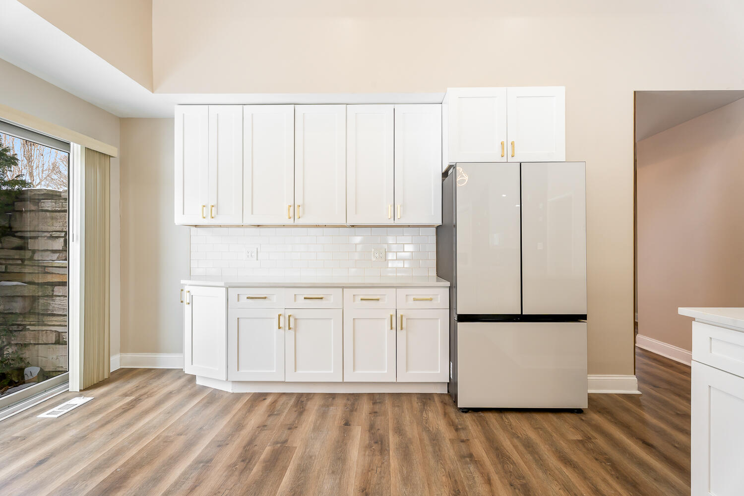 902 Cornwallis Lane Munster, IN 46321 - Photo 19 of 59 a kitchen with granite countertop white cabinets and refrigerator