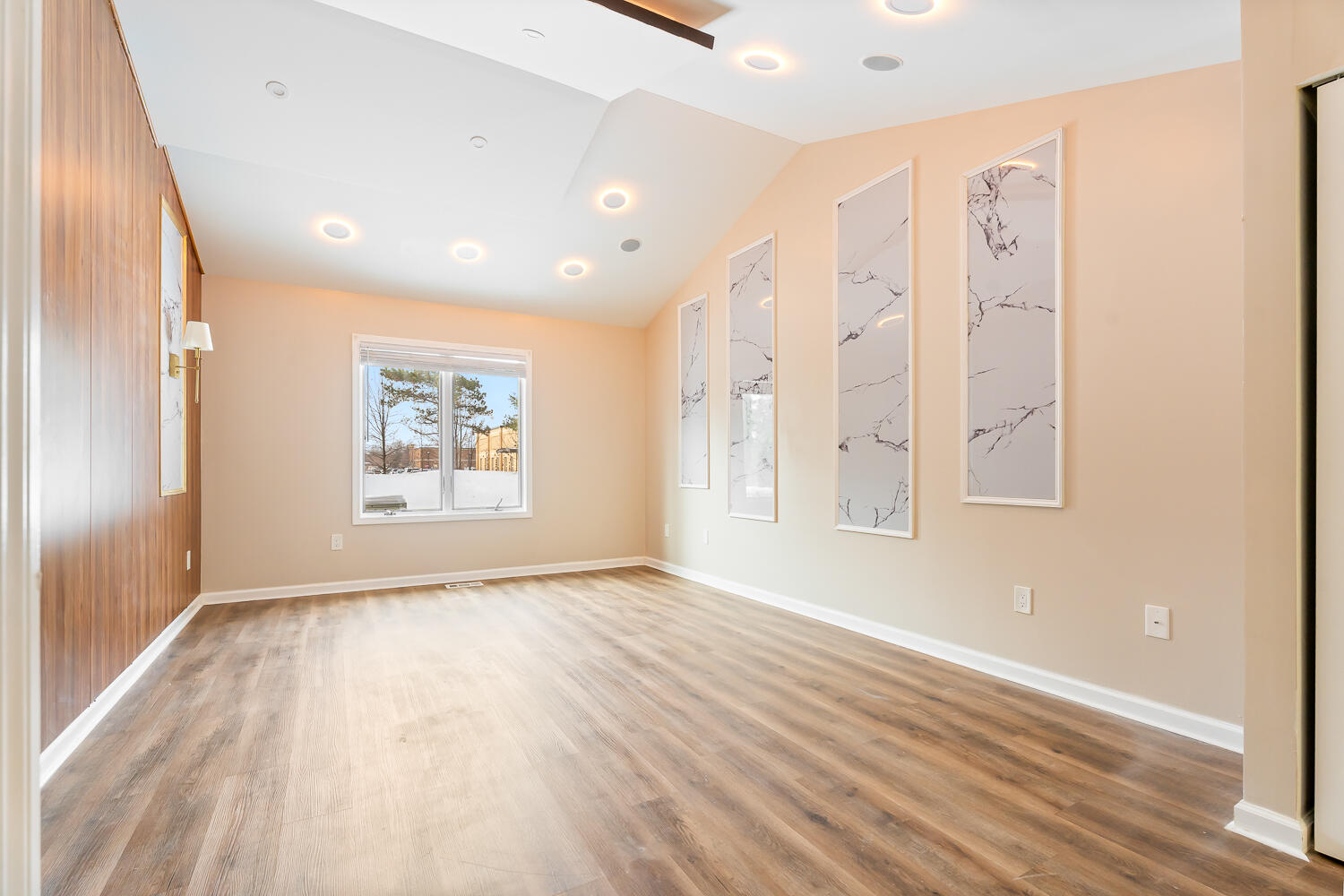 902 Cornwallis Lane Munster, IN 46321 - Photo 23 of 59 an empty room with wooden floor and windows