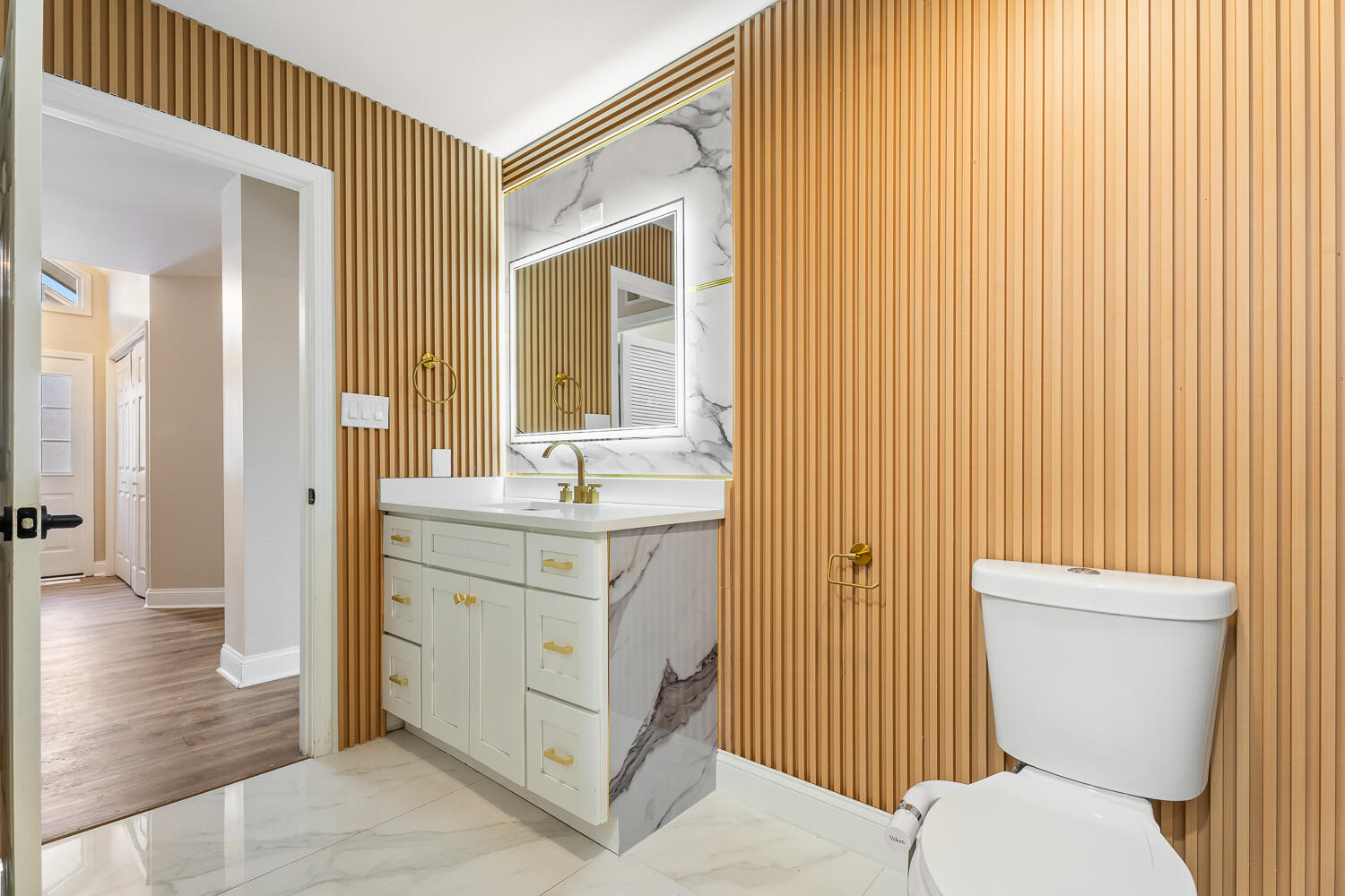 902 Cornwallis Lane Munster, IN 46321 - Photo 45 of 59 a bathroom with a sink a toilet and shower