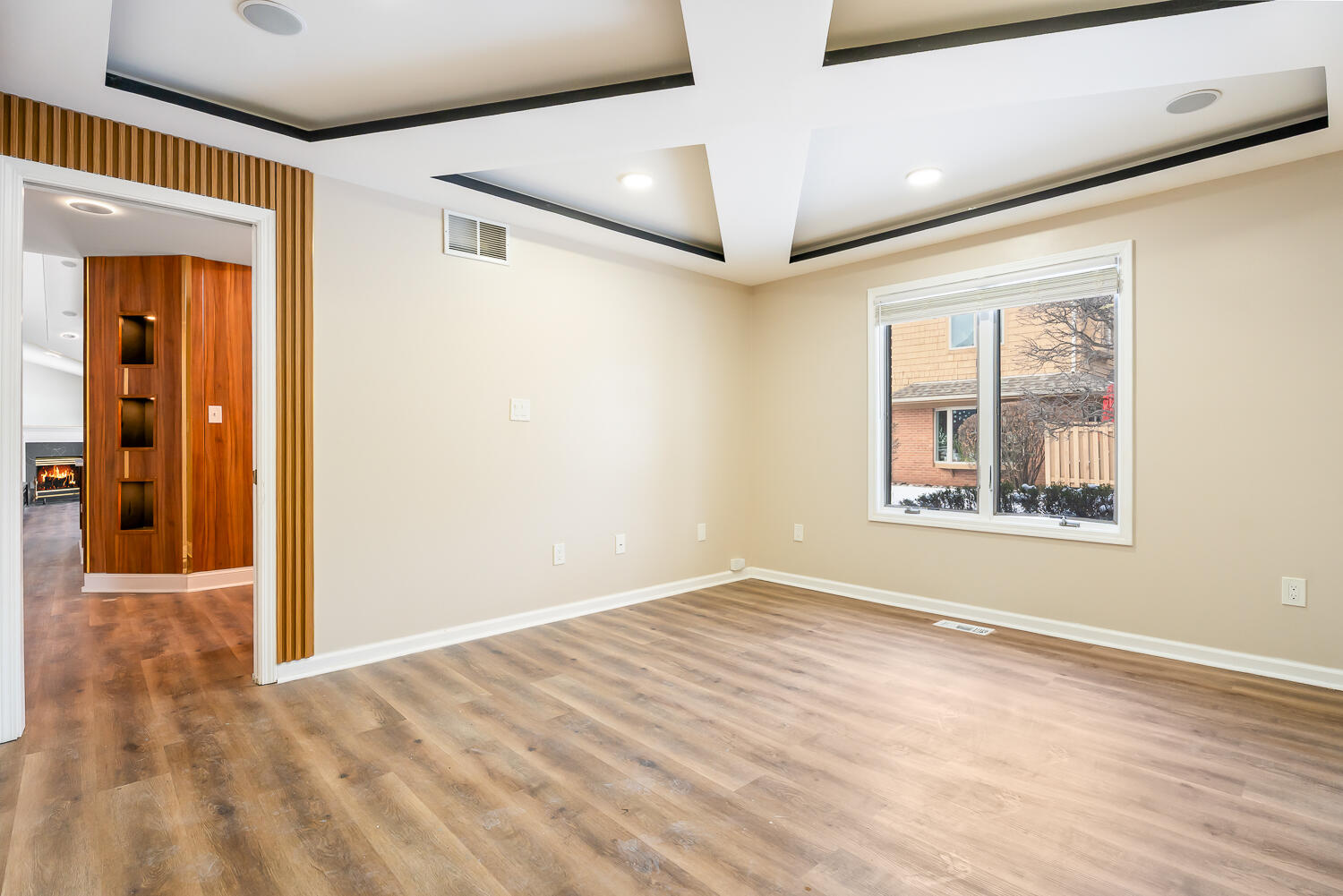 902 Cornwallis Lane Munster, IN 46321 - Photo 49 of 59 an empty room with wooden floor and windows