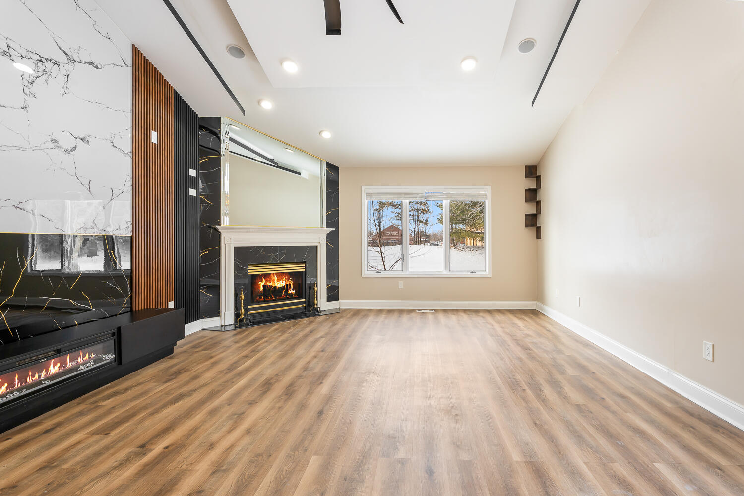 902 Cornwallis Lane Munster, IN 46321 - Photo 7 of 59 a view of an empty room with a fireplace and a window