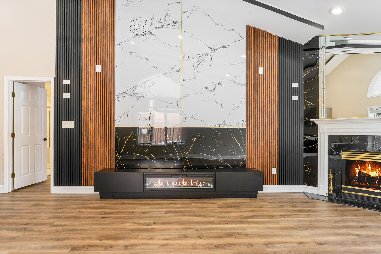 902 Cornwallis Lane Munster, IN 46321 - Photo 9 of 59 a living room with a fireplace and a wooden floor