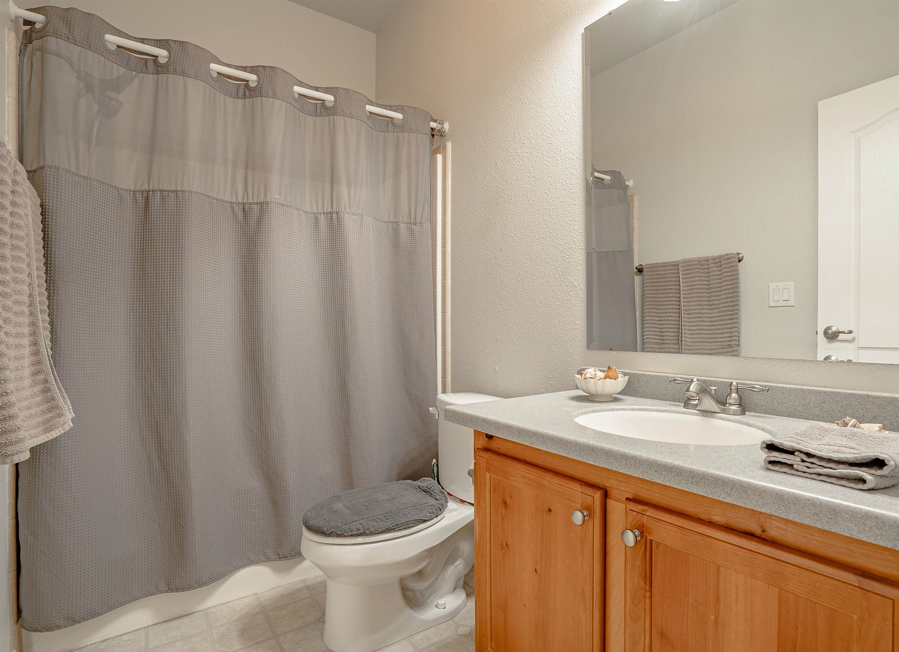 714-100 Sears Road Janesville, CA 96114 - Photo 24 of 35 a bathroom with a sink a toilet and a mirror