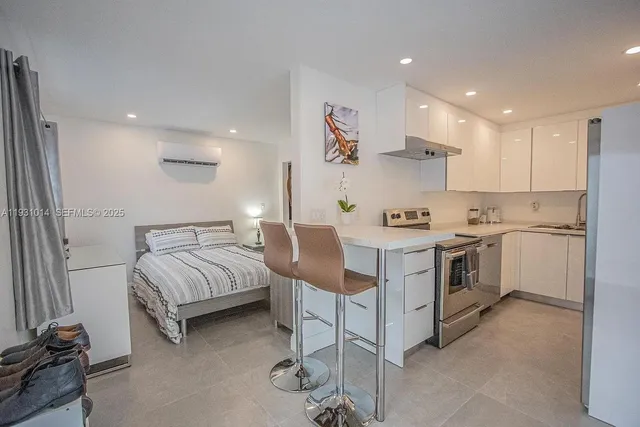 a bathroom with a sink toilet and mirror