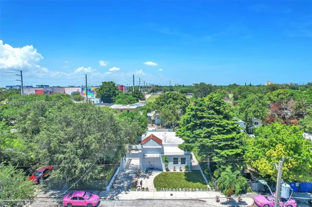 a view of city and green space