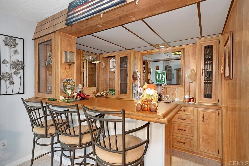 18218 Paradise Mountain Road Valley Center, CA 92082 - Photo 15 of 37 a view of a dining room with furniture window and outside view