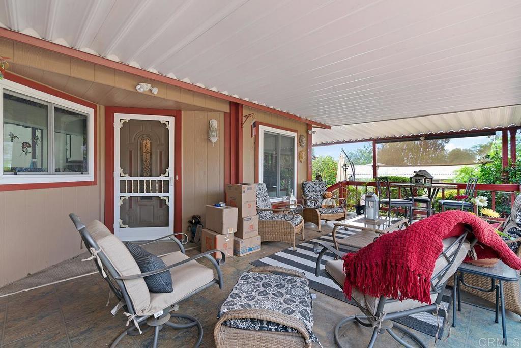 18218 Paradise Mountain Road Valley Center, CA 92082 - Photo 28 of 37 a view of a dining room with furniture window and outside view