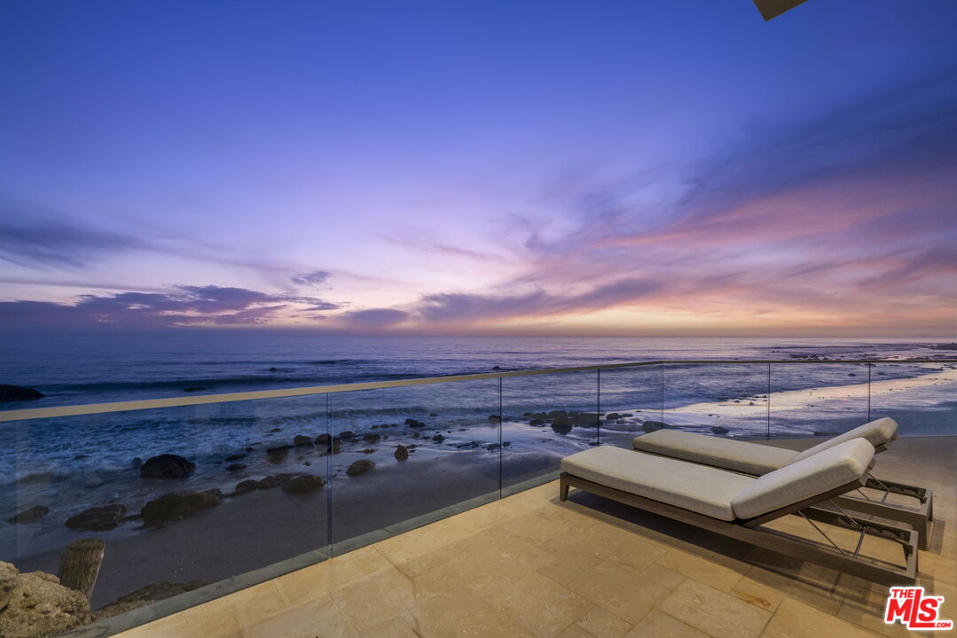 24146 Malibu Road Malibu, CA 90265 - Photo 22 of 25 a view of a terrace with sky view