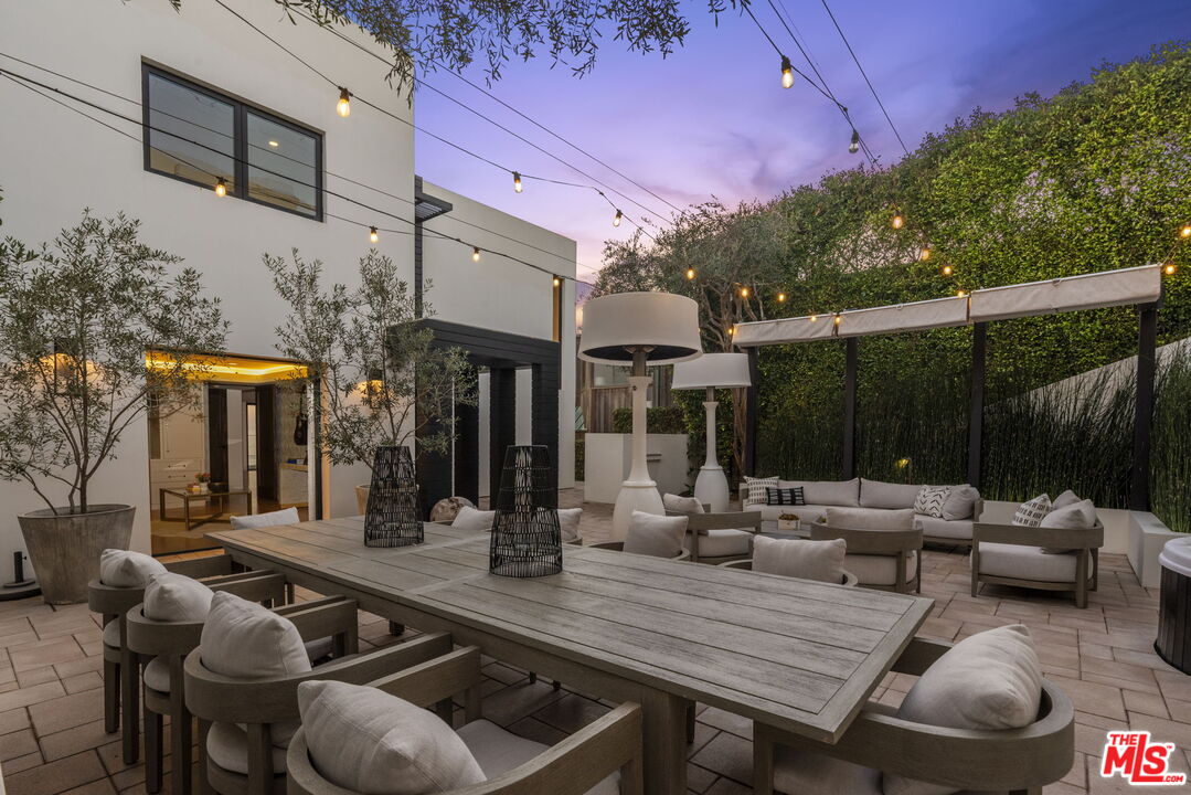 24146 Malibu Road Malibu, CA 90265 - Photo 4 of 25 a outdoor space with patio fireplace and furniture