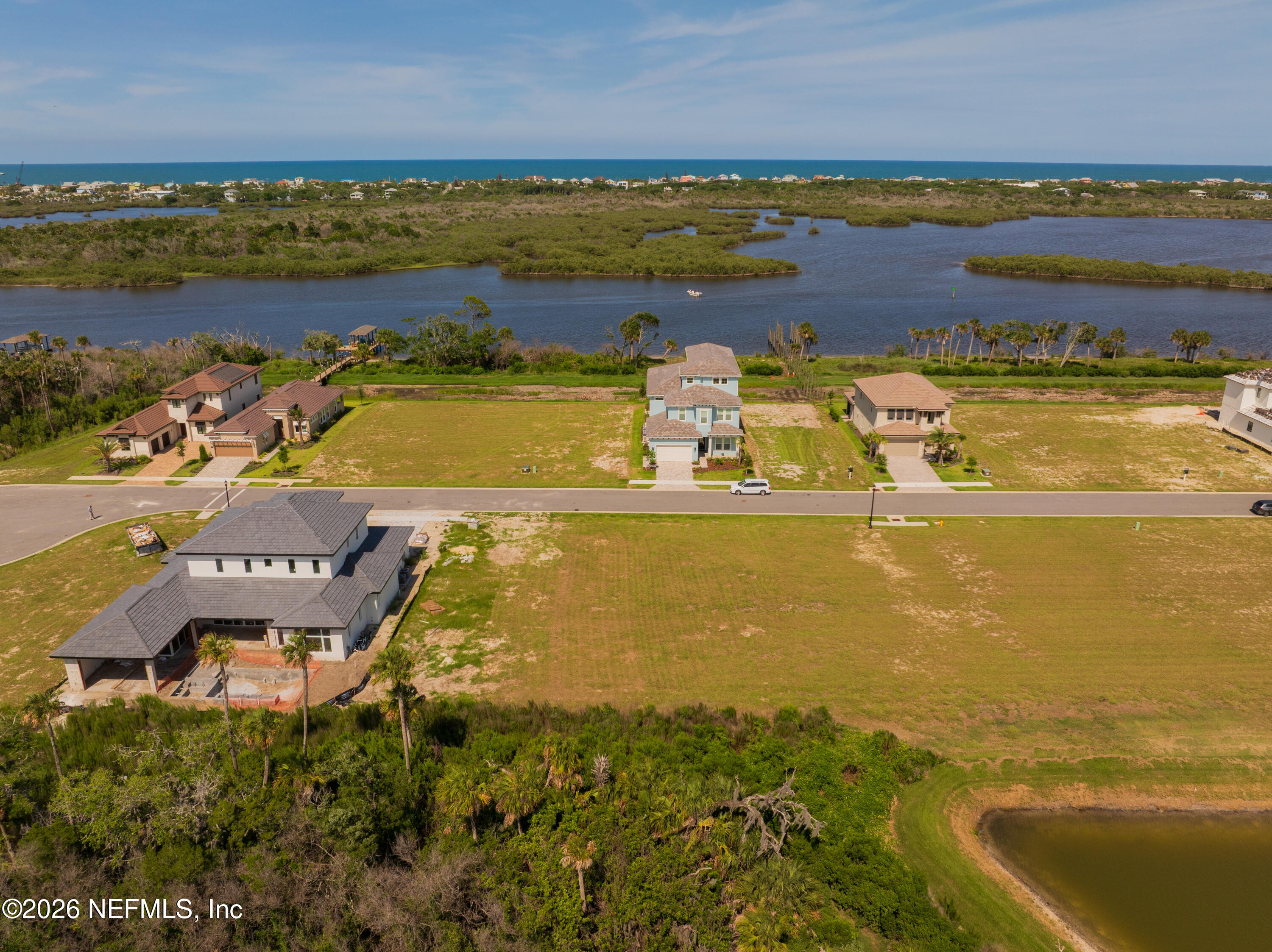 9 Coronado Road Flagler Beach, FL 32136 - Photo 2 of 5 a view of a city with an ocean view
