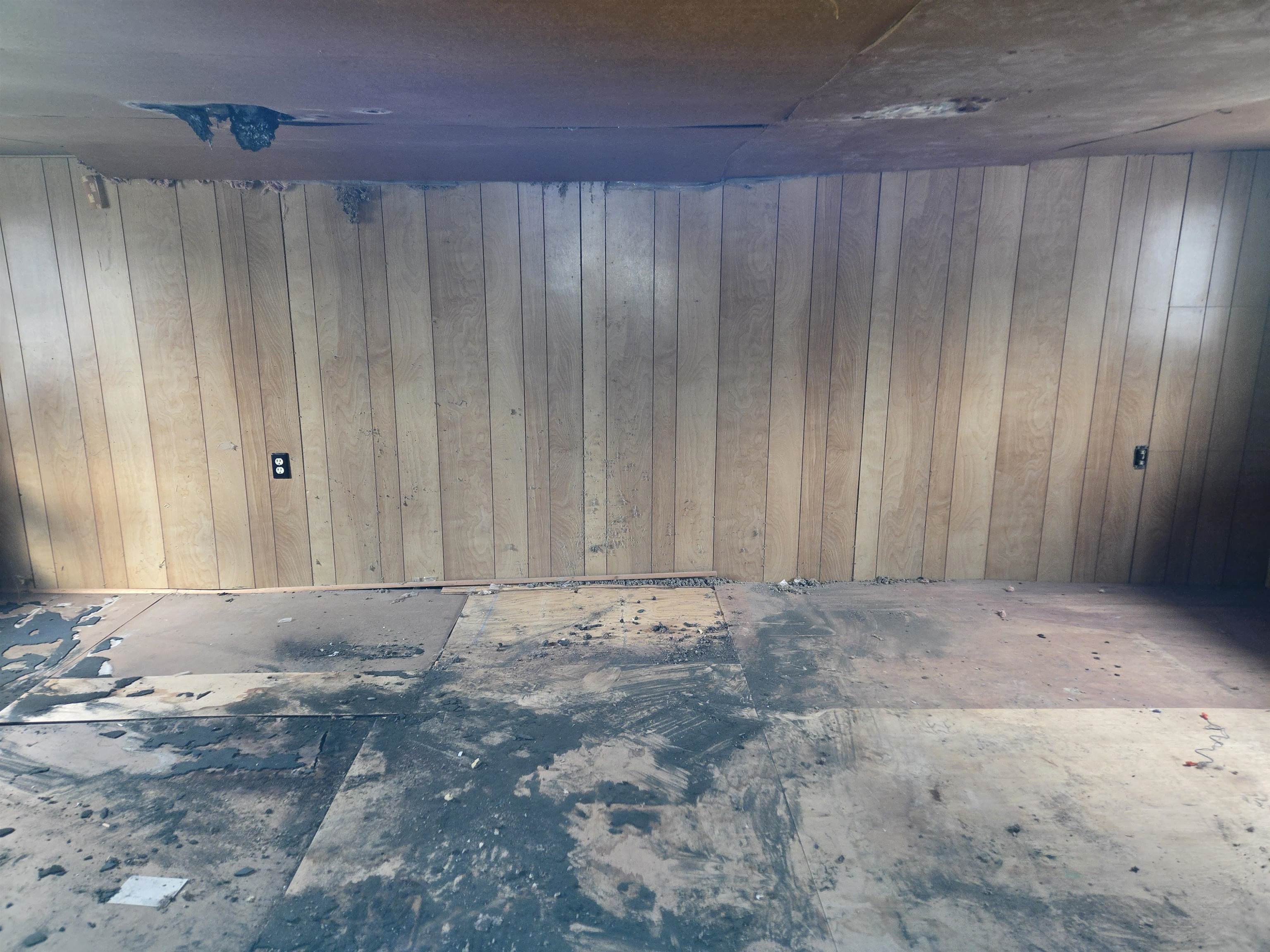 412 East Colden Street Polo, IL 61064 - Photo 8 of 11 a view of an empty room with wooden walls