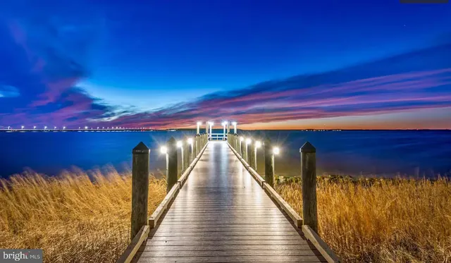 a view of balcony with wooden floor