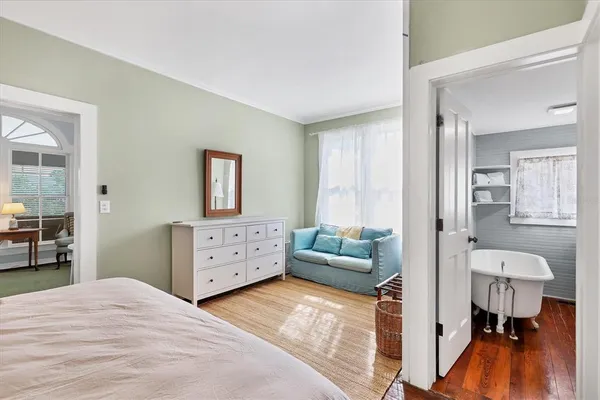 a bathroom with a toilet sink and shower