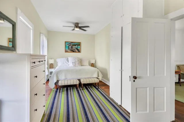 a bathroom with a toilet a sink and a mirror