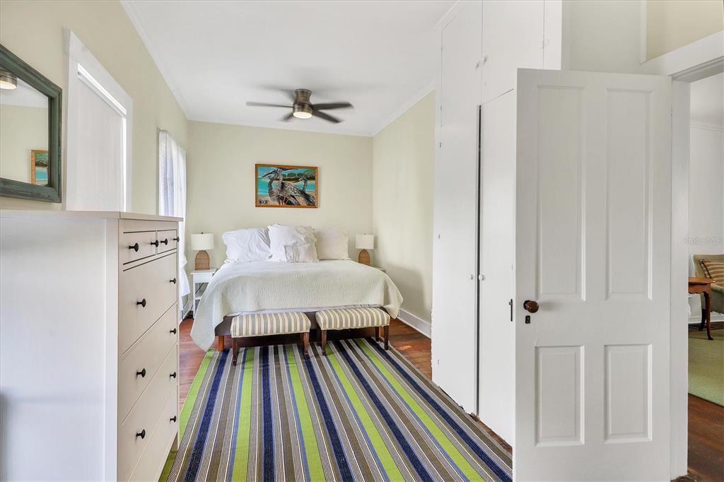 231 Gilchrist Avenue Boca Grande, FL 33921 - Photo 26 of 53 a bedroom with a bed and a rug