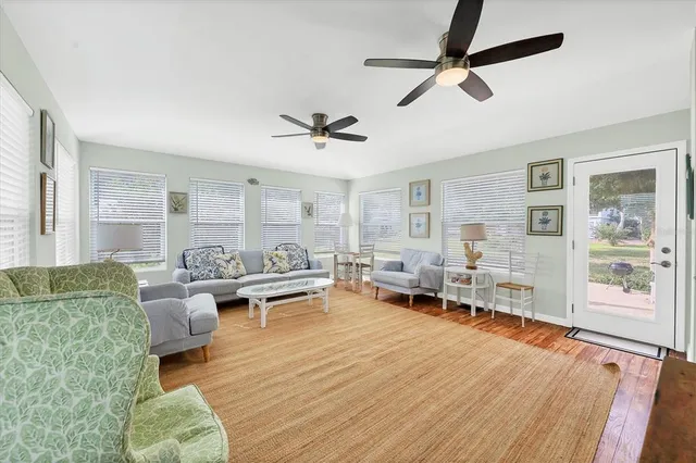 a view of a sitting area with furniture and garden