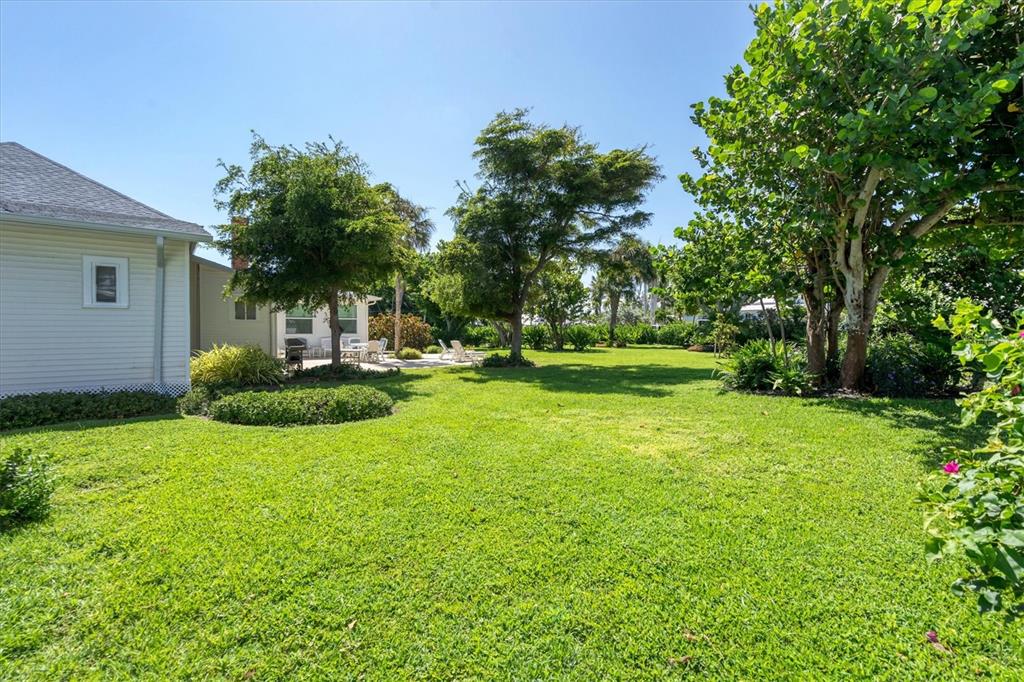 231 Gilchrist Avenue Boca Grande, FL 33921 - Photo 39 of 53 a view of a house with a yard
