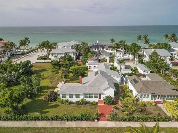 an aerial view of a house with a garden