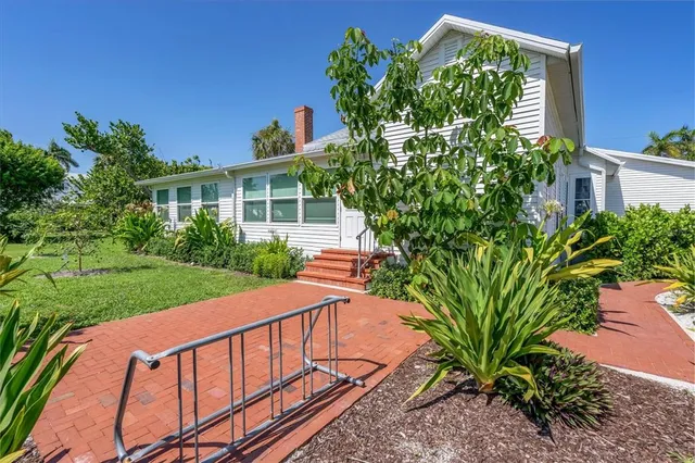 a view of balcony with furniture