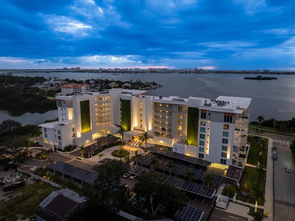 1020 Sunset Point Road, Unit 511 Clearwater, FL 33755 - Photo 8 of 99 a front view of a house with outdoor seating