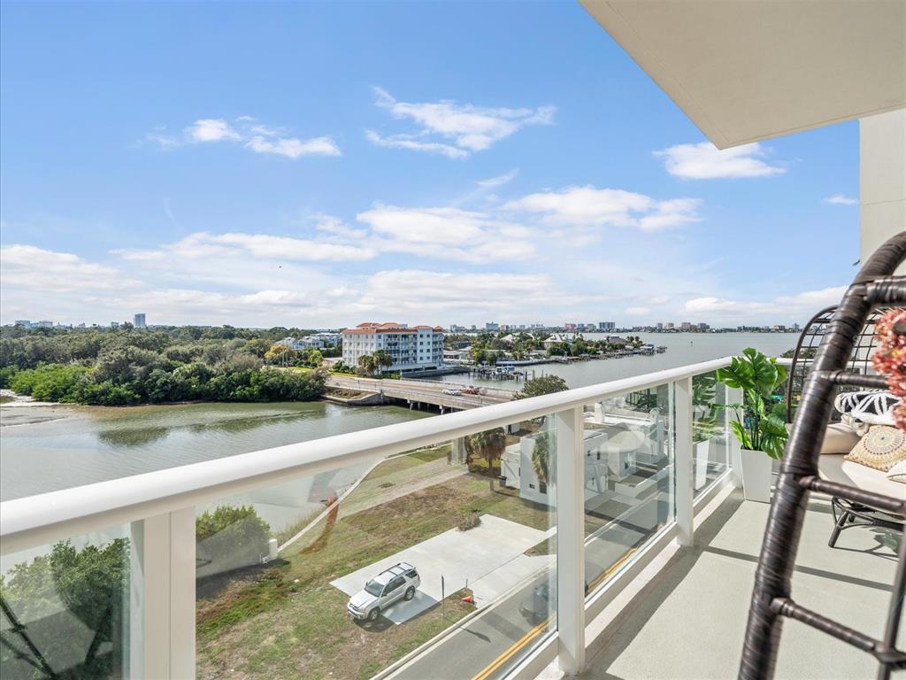 1020 Sunset Point Road, Unit 511 Clearwater, FL 33755 - Photo 85 of 99 a view of a lake from a balcony