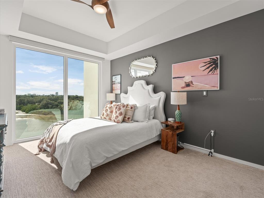 1020 Sunset Point Road, Unit 511 Clearwater, FL 33755 - Photo 94 of 99 a bedroom with a bed and window