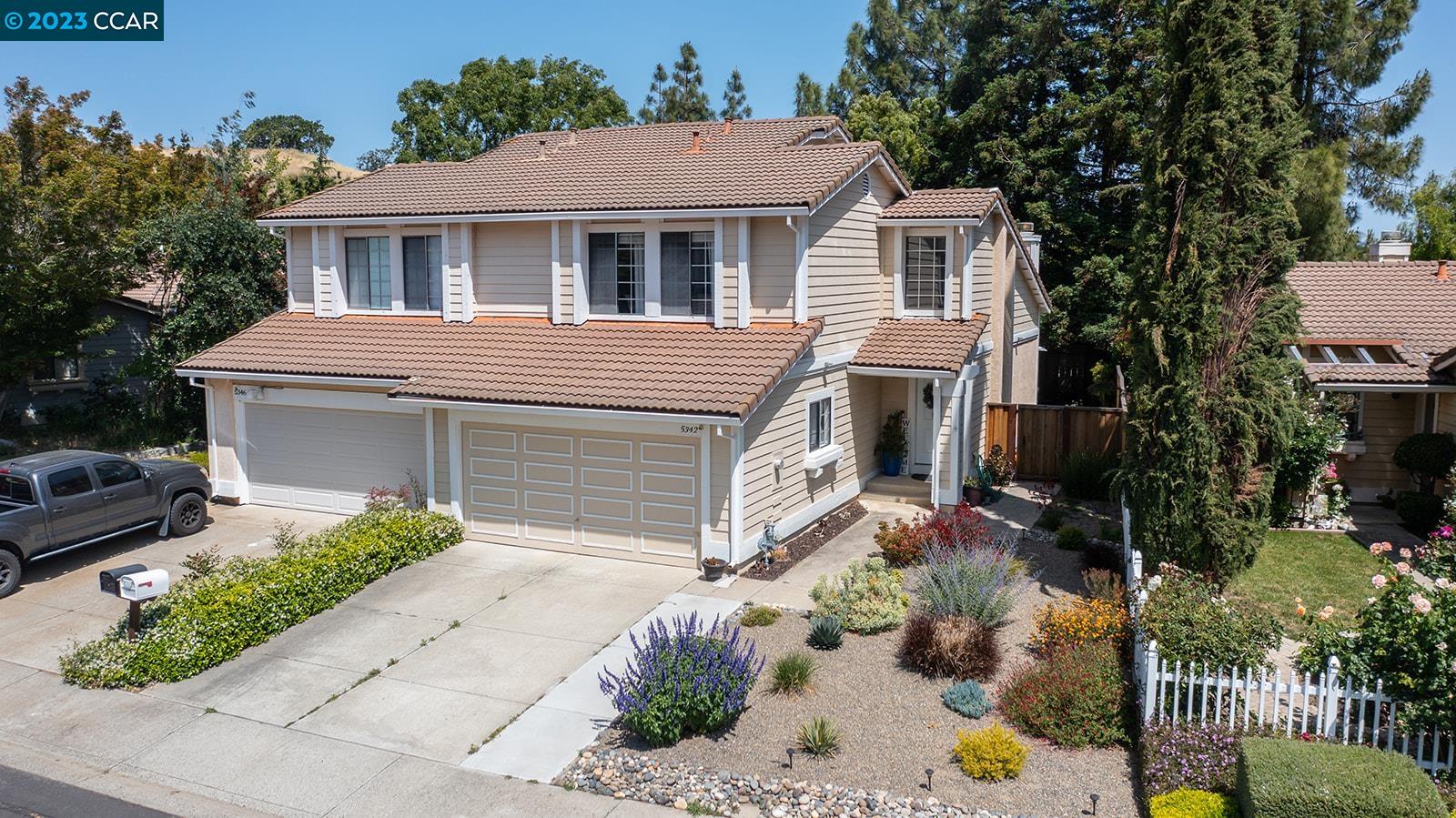 a house view with a outdoor space