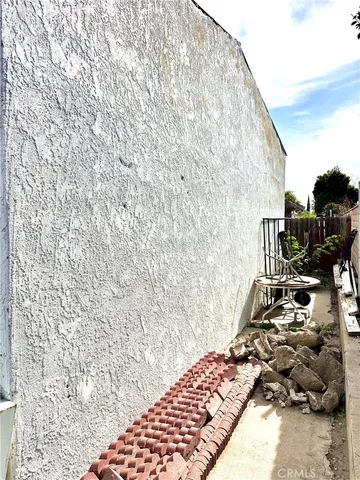 a view of outdoor space with wooden fence