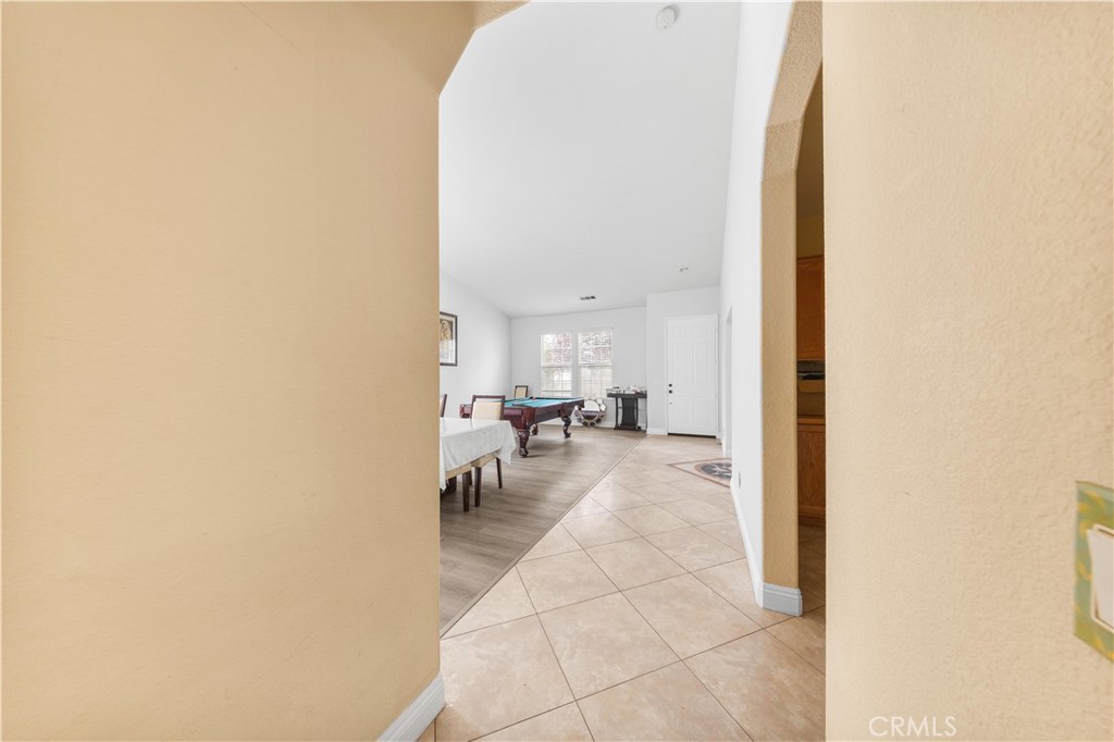 34314 Desert Road Acton, CA 93510 - Photo 21 of 46 a view of a living room with a chair and potted plant
