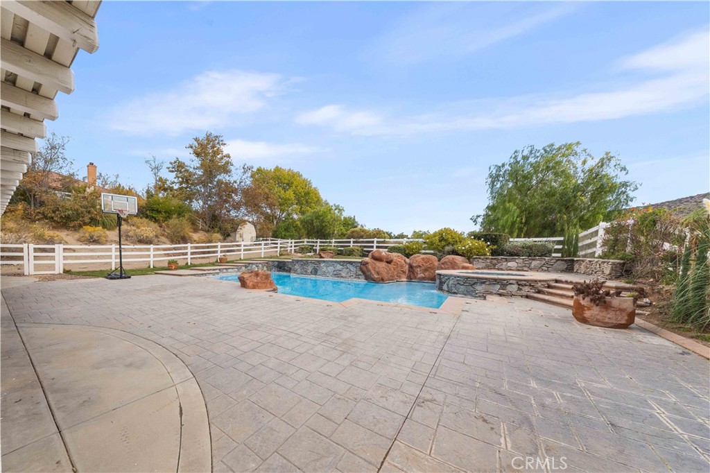 34314 Desert Road Acton, CA 93510 - Photo 37 of 46 a view of swimming pool with outdoor seating and city view