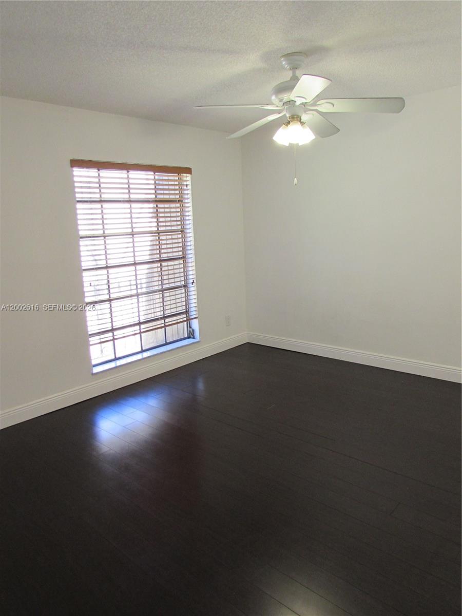 5555 Ludlam Road, Unit 23 South Miami, FL 33155 - Photo 11 of 25 an empty room with a window