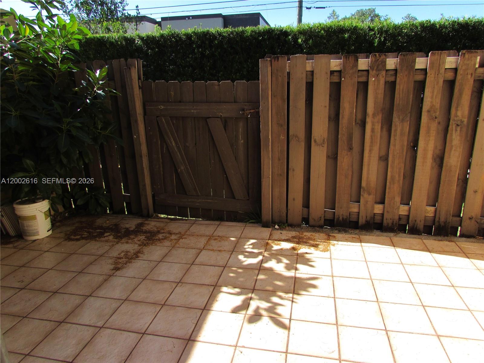 5555 Ludlam Road, Unit 23 South Miami, FL 33155 - Photo 24 of 25 a view of wooden fence