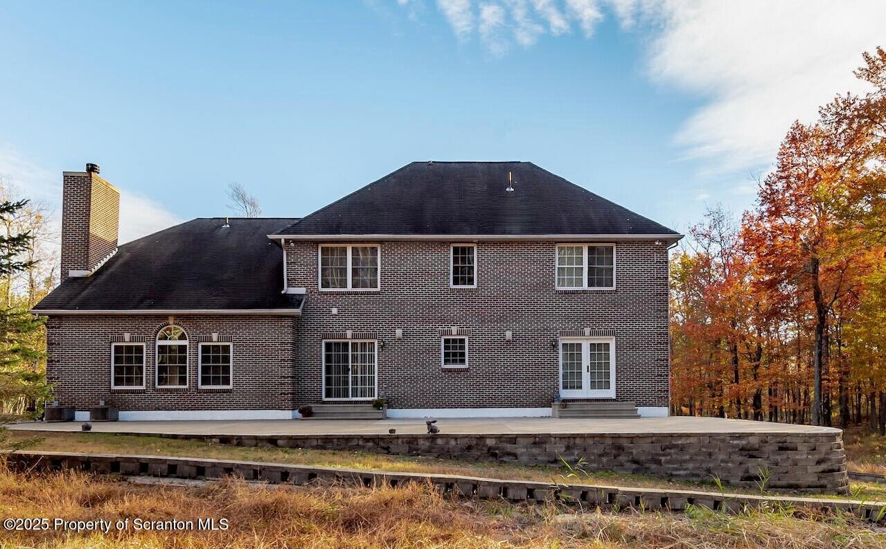 1300 Sandspring Road Wilkes Barre, PA 18702 - Photo 23 of 26 a front view of a house with a yard
