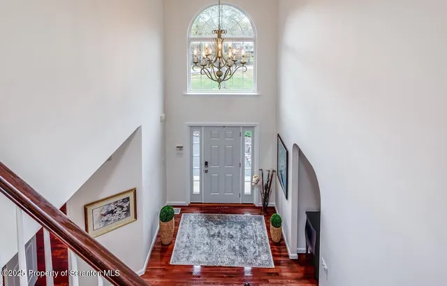 a view of an entryway with a rug