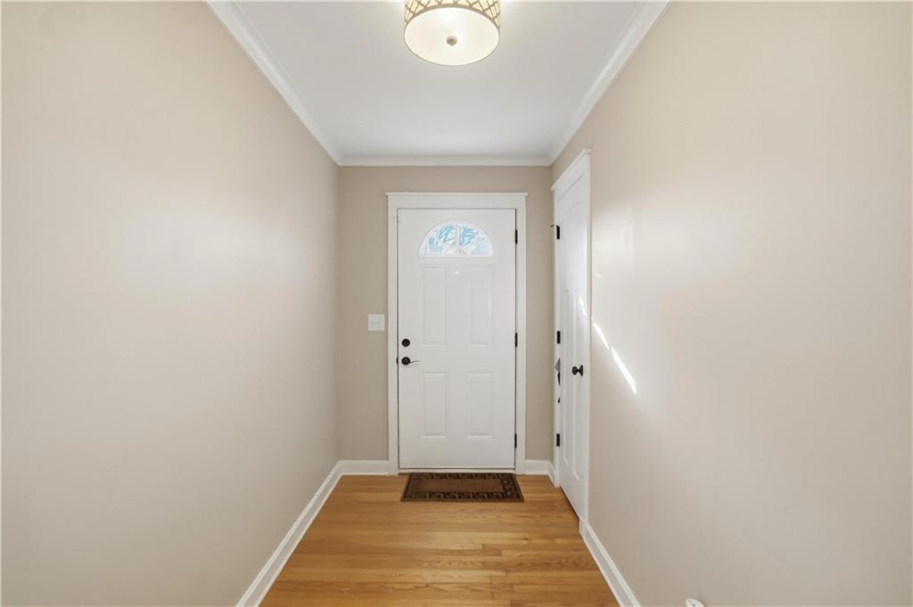 1394 North Druid Hills Road Northeast Brookhaven, GA 30319 - Photo 13 of 38 a view of a livingroom with wooden floor and a sink
