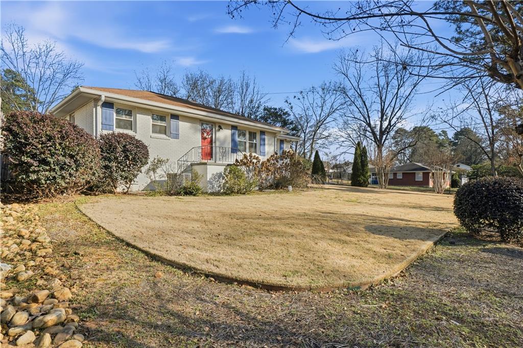 1394 North Druid Hills Road Northeast Brookhaven, GA 30319 - Photo 27 of 38 a view of outdoor space yard and lake view