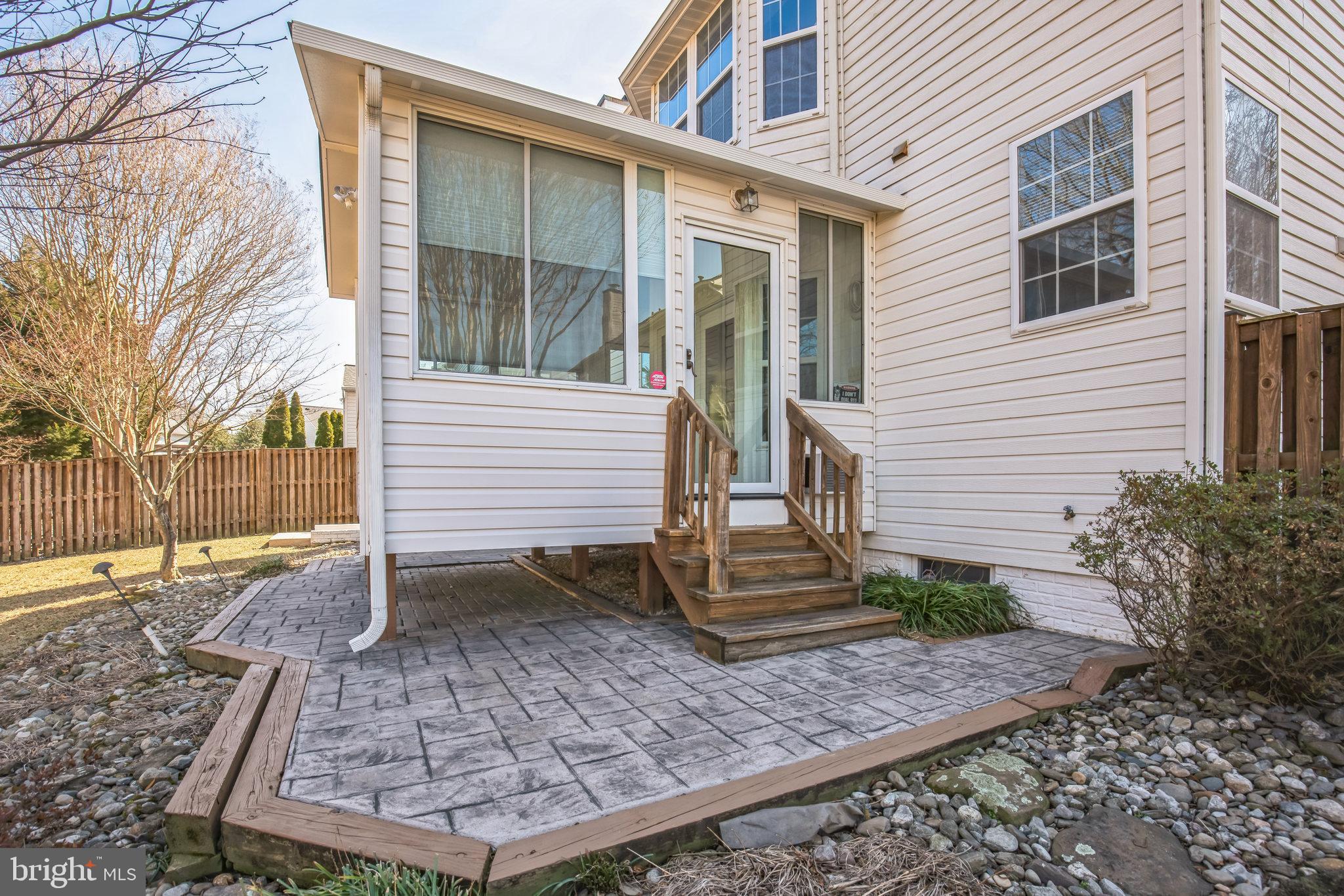 1557 Chapman Road Crofton, MD 21114 - Photo 36 of 39 Access on both sides of sunroom onto patio.