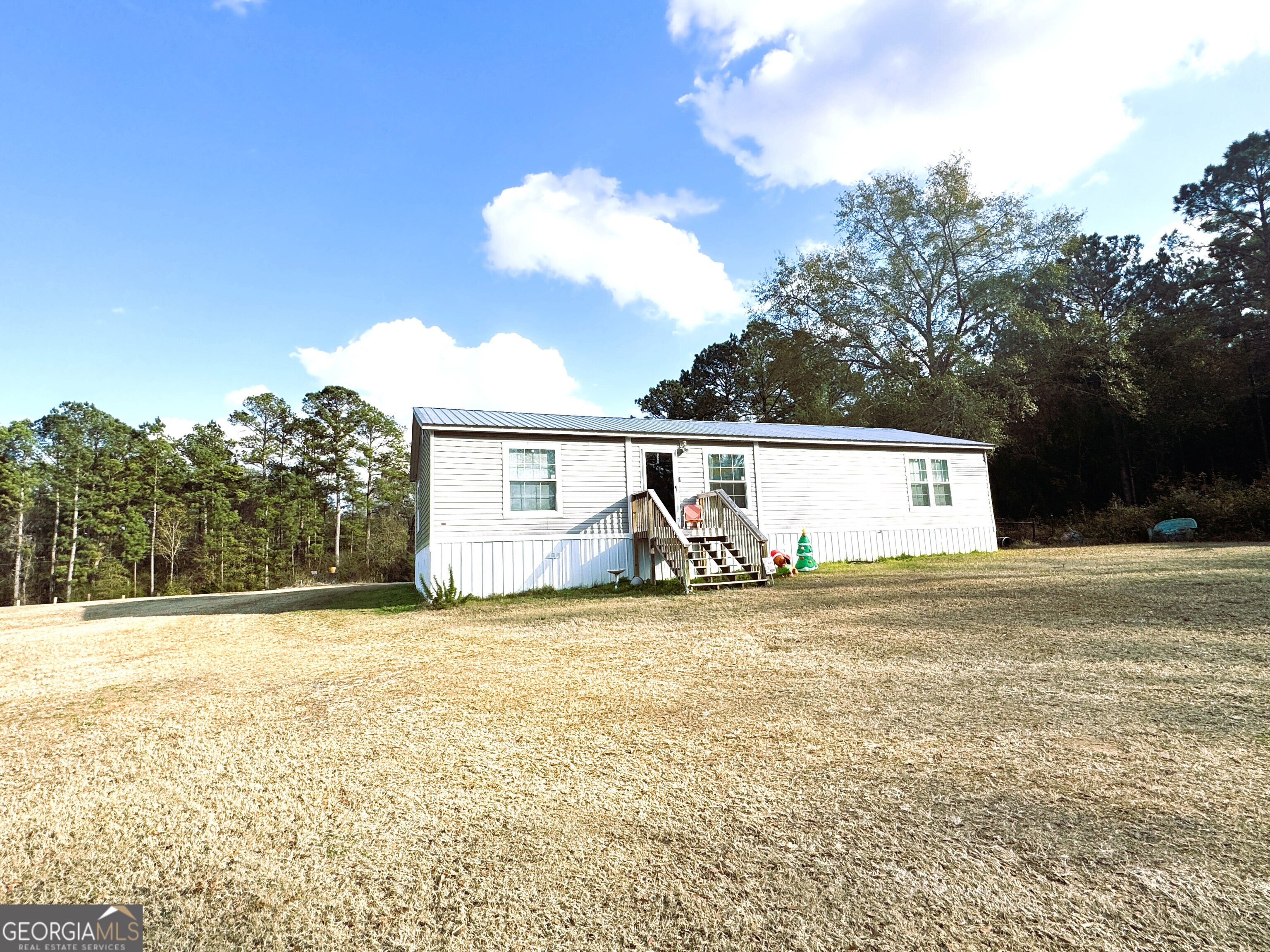 105 Dowdy Court Perry, GA 31069 - Photo 2 of 12 a view of a outdoor space of a house