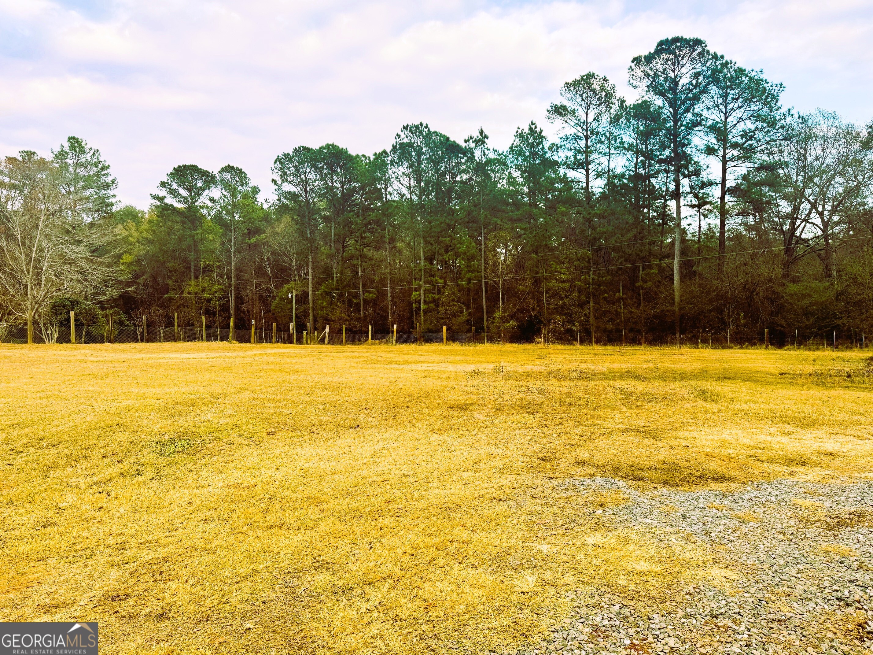 105 Dowdy Court Perry, GA 31069 - Photo 10 of 12 a swimming pool with an outdoor space and seating area