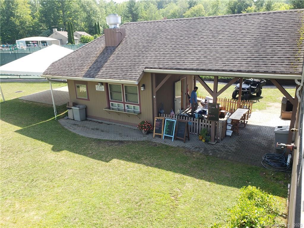 Lot 5 Milton Road Goshen, CT 06756 - Photo 24 of 31 an outdoor view of house with swimming pool and furniture