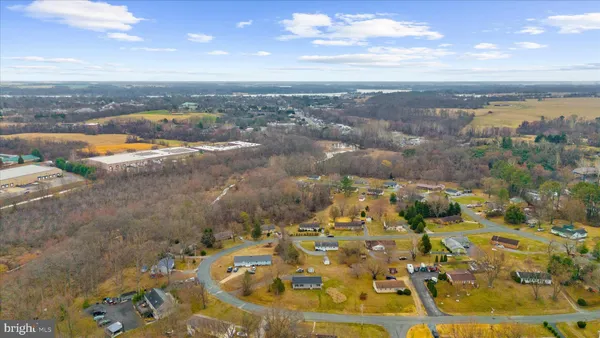 a view of a wall with paintings on the wall