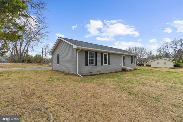 a house view with a garden space