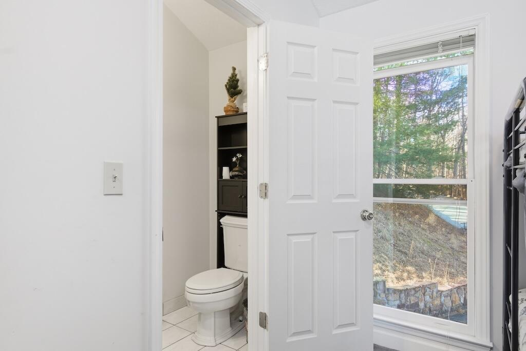 3537 Ferncliff Road Pulaski, VA 24301 - Photo 27 of 50 a bathroom with a toilet and a shower