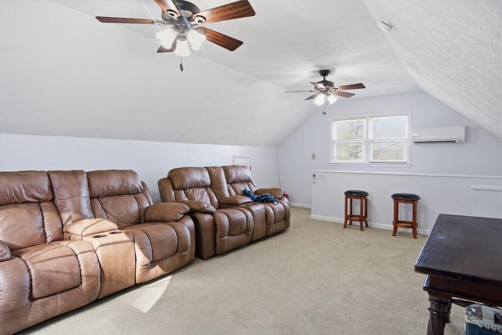 3537 Ferncliff Road Pulaski, VA 24301 - Photo 33 of 50 a living room with furniture a ceiling fan and a rug